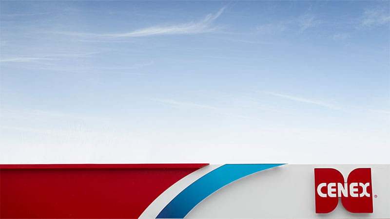 Top of Cenex gas station canopy against a blue sky